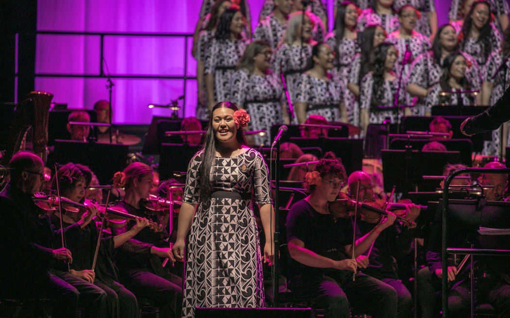 Signature Choir and the NZSO on stage at Spark Arena, Auckland.