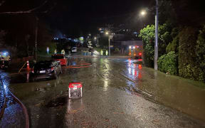 Flooding is affecting streets in Queenstown as heavy rain affects much of the South Island.