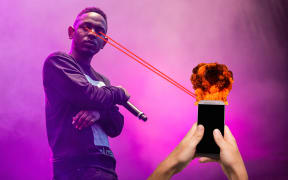 Kendrick Lamar lazering an annoying person's cellphone with his eyes.