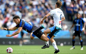 AUCKLAND, NEW ZEALAND - OCTOBER 27: Louis Verstraete of Auckland FC is tackled by Corey Hollman of Sydney FC during the round two A-League Men match between Aukland FC and Sydney FC at Go Media Stadium, on October 27, 2024, in Auckland, New Zealand. (Photo by Hannah Peters/Getty Images)