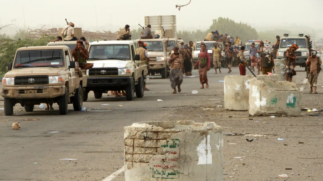 Yemeni pro-government forces arrive in al-Durayhimi district, about nine kilometres south of Hudaydah international airport.