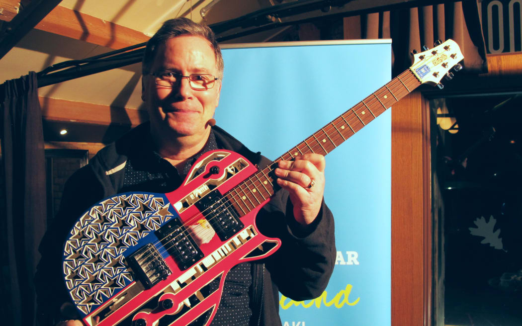 Prof Olaf Diegel and one of his 3D printed guitars