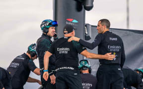 Pat on the back from Ray Davies, ETNZ Coach, Peter Burling, ETNZ skipper, and Blair Tuke, ETNZ Flight Controller, after winning both races of day one of the Louis Vuitton 37th America’s Cup in Barcelona, Spain on Saturday 12 October 2024.
Photo credit: Georgia Schofield / www.photosport.nz