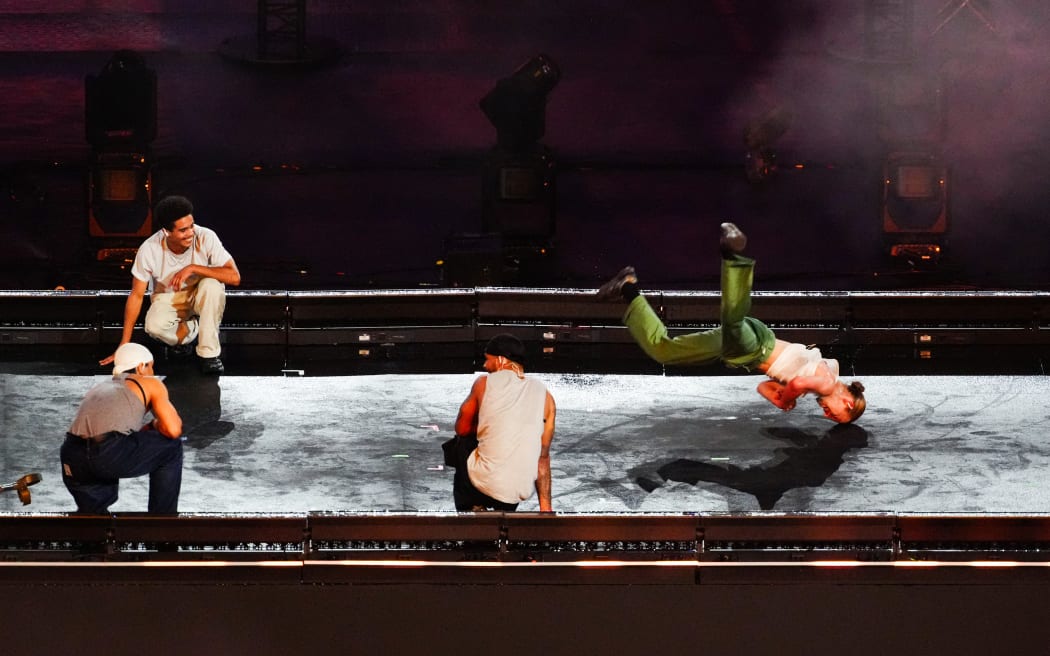 Dancers perform on stage during the Paris 2024 Paralympic Games Closing Ceremony at the Stade de France, in Saint-Denis, in the outskirts of Paris, on September 8, 2024. (Photo by Dimitar DILKOFF / AFP)