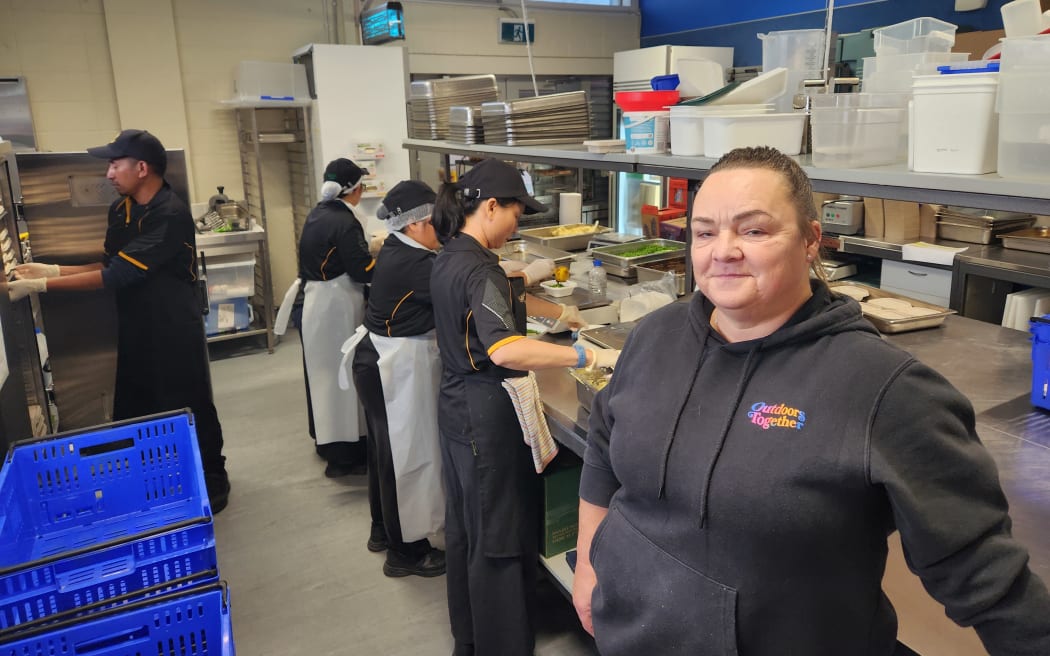 Porirua College canteen manager Antoinette Van Den Elzen oversees lunch production in the school's kitchen.