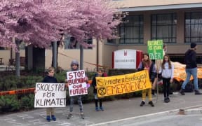 Young protesters outside the 2019 Petroleum New Zealand Conference in Queenstown.