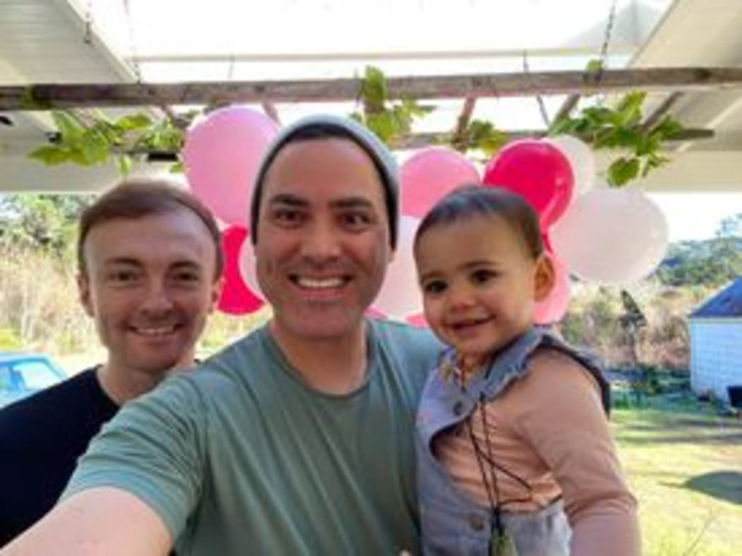 Tim Knowlman with his husband Poroutu and daughter Te Awa.