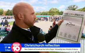 Daniel Sutton of Australia's Channel 10 praises The Press at last Friday's vigil.