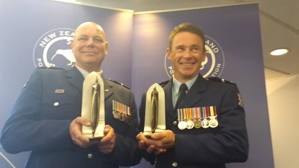 Constable Darren Critchley and Retired Senior Constable Ross Andrew.