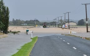 The road from Baylys Beach to Dargaville in Northland flooded yesterday.