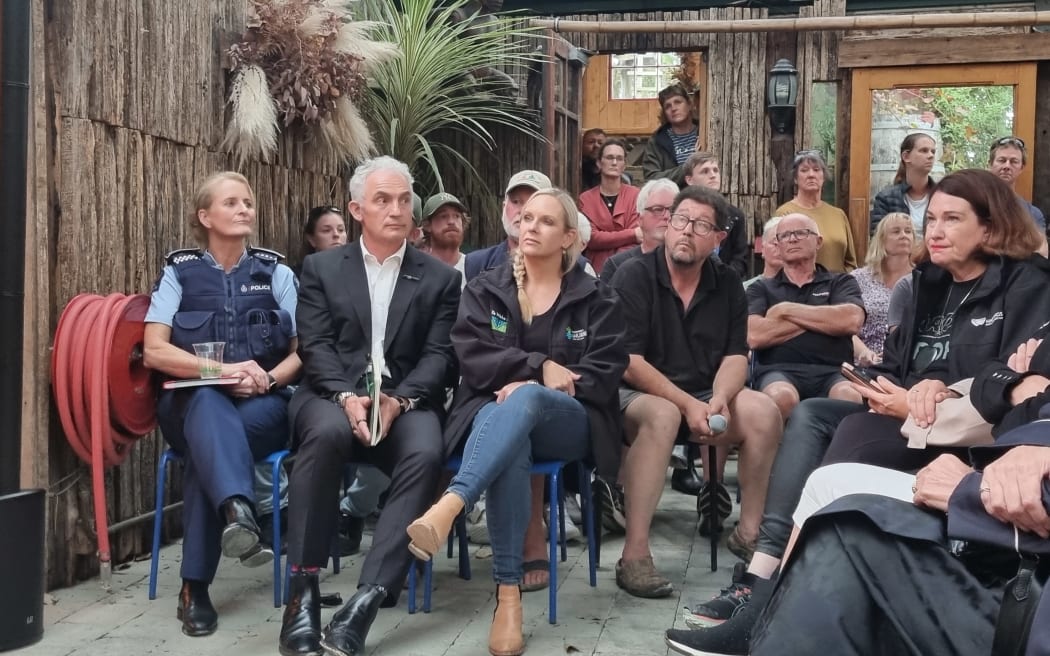 Eastern district police commander Superintendent Jeanette Park, left, and Police Minister Stuart Nash, second left, listen to Hawke's Bay residents at a meeting on safety after Cyclone Gabrielle, Tuesday 28 February 2023.