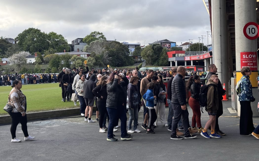 Thousands of registered participants file into the stands at Eden Park.