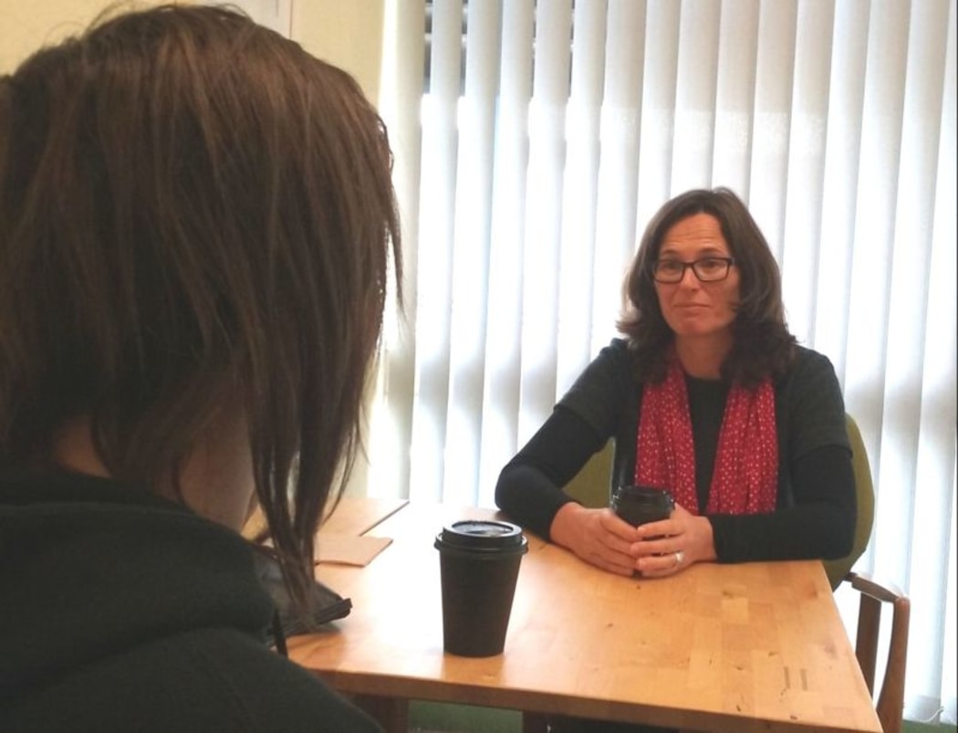 Shae Ronald of Youthline talks to Pop Up Health Clinic client Olivia