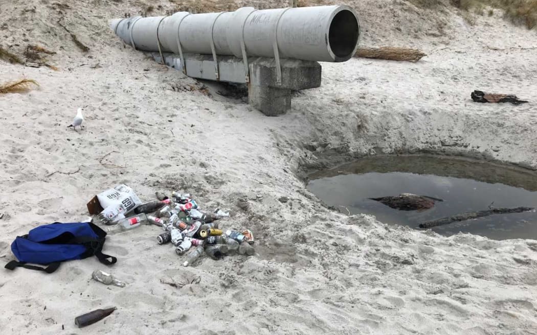 Remnants of a beach party at Omanu Beach in 2020.