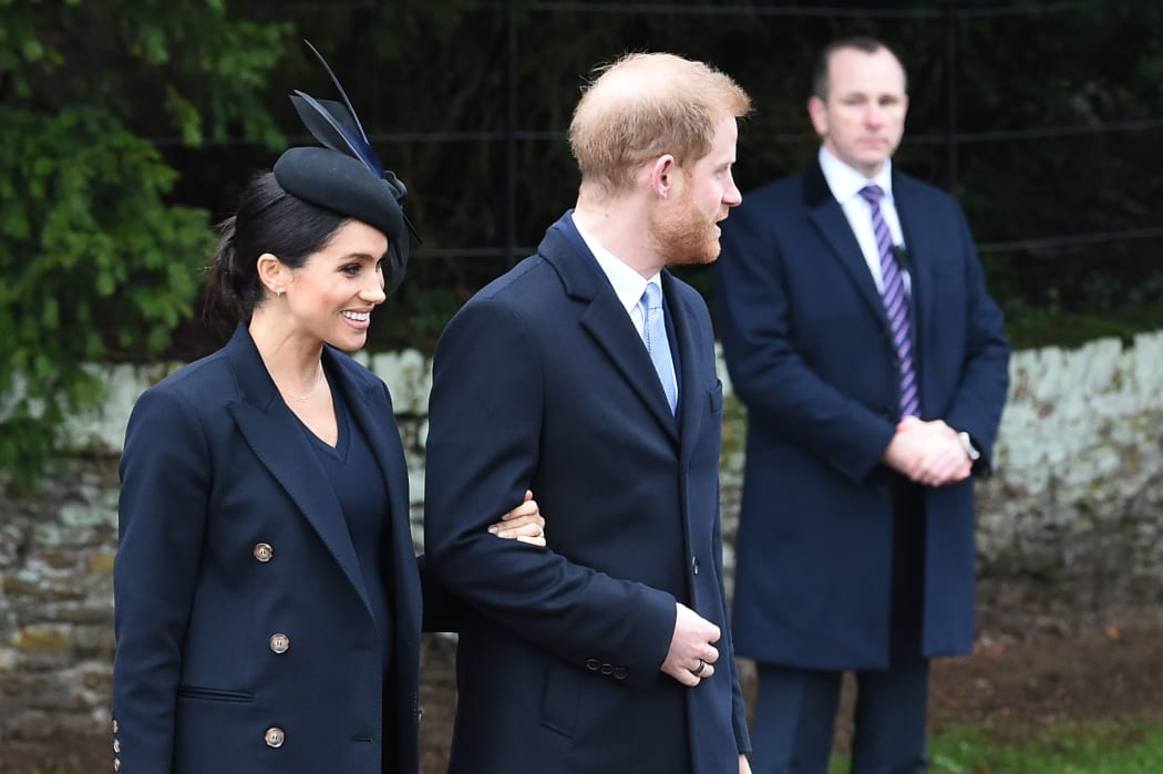 Meghan, Duchess of Sussex and Britain's Prince Harry, Duke of Sussex, depart after the Royal Family's traditional Christmas Day service at St Mary Magdalene Church in Sandringham, Norfolk, eastern England, on December 25, 2018.