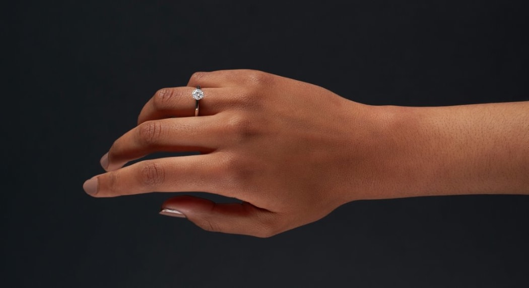 Floeting diamond setting developed by Wellington jeweller.