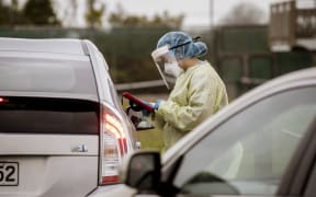A resident getting tested at a pop-up testing centre in the South Auckland suburb of Clover Park