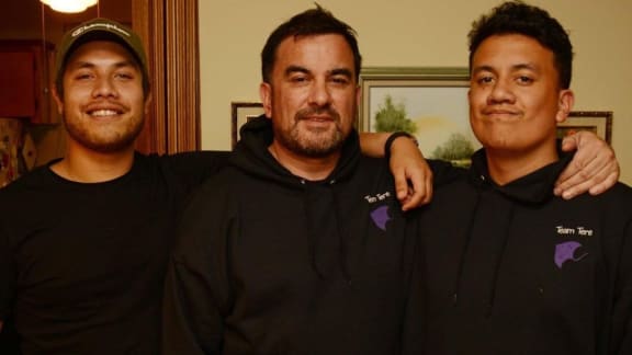 Vaitoa Mallon (far right) explains how he stays connected to his Kiribati roots. Pictured alongside his brother Manoa Teaiwa and father Sean Mallon (centre).