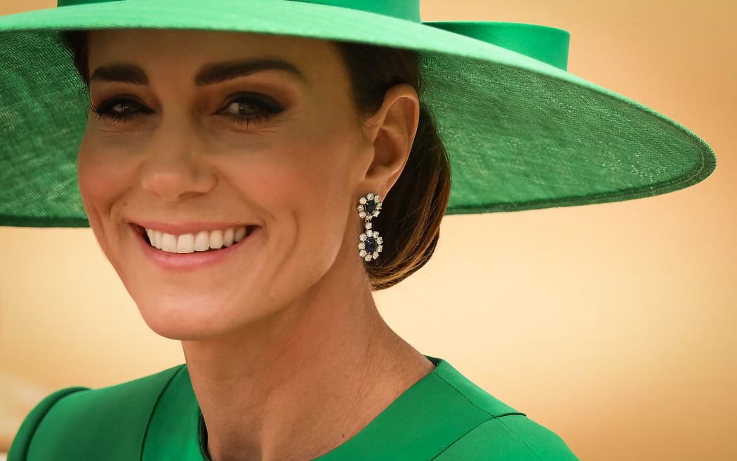 Catherine, Princess of Wales, arrives in a horse-drawn carriage on Horse Guards Parade for the King's Birthday Parade, 'Trooping the Colour', in London on June 17, 2023. Catherine, Princess of Wales, is facing up to two weeks in in hospital following planned abdominal surgery, the British royal's office said on January 17, 2024.