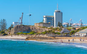 The man was reportedly attached at Port Beach, to the left of Bathers Beach (shown).