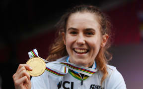 Niamh Fisher Black of New Zealand on the podium after taking the victory in the U23 category at 2022 Road World Championships