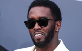 (FILE) Diddy's Los Angeles and Miami Homes Raided by Federal Law Enforcement on Monday, March 25, 2024. LAS VEGAS, NEVADA, USA - MAY 15: American rapper, record producer and record executive Diddy (Sean Love Combs, also known by his stage names Puff Daddy or P. Diddy) arrives at the 2022 Billboard Music Awards held at the MGM Grand Garden Arena on May 15, 2022 in Las Vegas, Nevada, United States. (Photo by Xavier Collin/Image Press Agency/NurPhoto) (Photo by Image Press Agency / NurPhoto / NurPhoto via AFP)