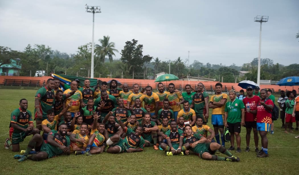 Vanuatu and Solomon Islands pose for a photo following the 2016 test in Port Vila.