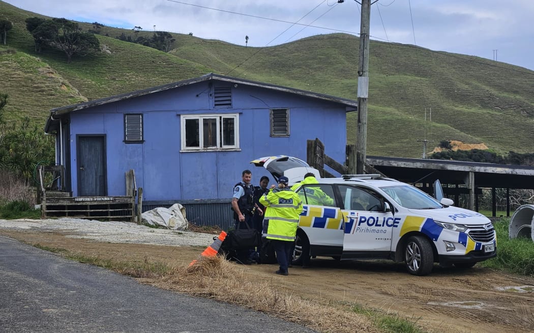 Police officers in Marokopa during search for Phillips family