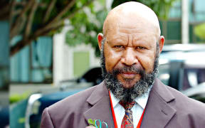 PNG minister of mines Johnson Tuke.