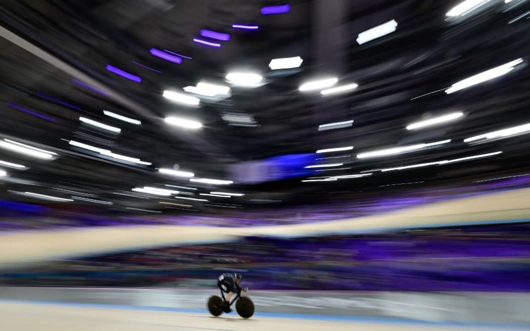 New Zealand's Ellesse Andrews competes in a women's track cycling sprint qualifying round of the Paris 2024 Olympic Games at the Saint-Quentin-en-Yvelines National Velodrome in Montigny-le-Bretonneux, south-west of Paris, on August 9, 2024. (Photo by John MACDOUGALL / AFP)