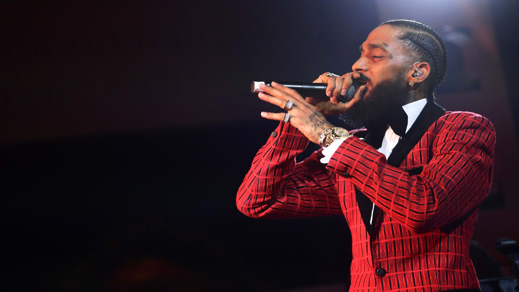 Nipsey Hussle performs onstage at the Warner Music Pre-Grammy Party in February.