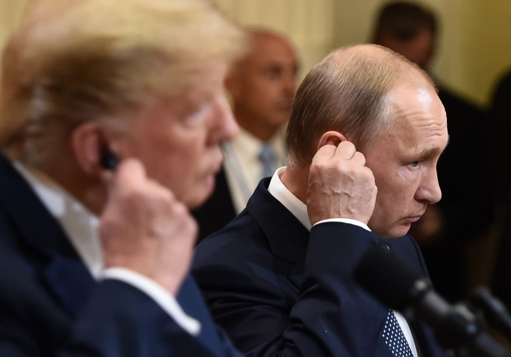 US President Donald Trump and Russia's President Vladimir Putin attend a joint press conference after a meeting at the Presidential Palace in Helsinki, on July 16, 2018.