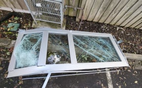 Damaged windows after the BP service station on Chapel Road, Botany, was targeted by ram raiders, 14 June 2022.