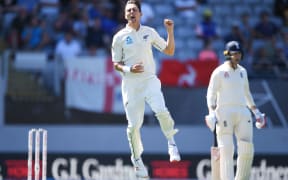 Trent Boult celebrates the wicket of England captain Joe Root.