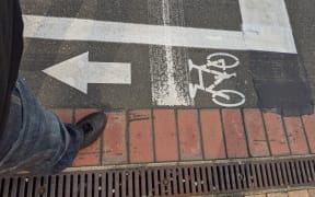 What appears to be a narrow cycle lane was painted on the road.