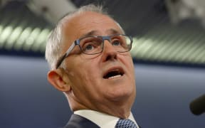 Australia's Communications Minister Malcolm Turnbull speaks at a press conference in Sydney on September 24, 2013.