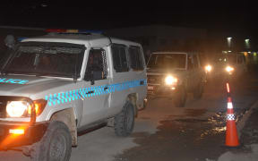 Solomon Islands' Police Response Team (PRT) on patrol during the first night of the country's trial lockdown. 29 August 2021