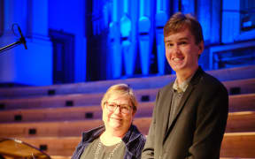 Young composer Geoffrey Hill with Leonie Holmes