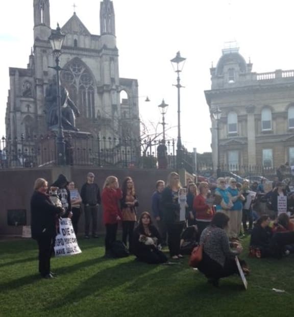 A small crowd gathered at the Octagon in Dunedin.
