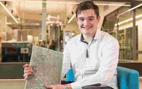 Logan Williams holds the didymo bioplastic which he invented