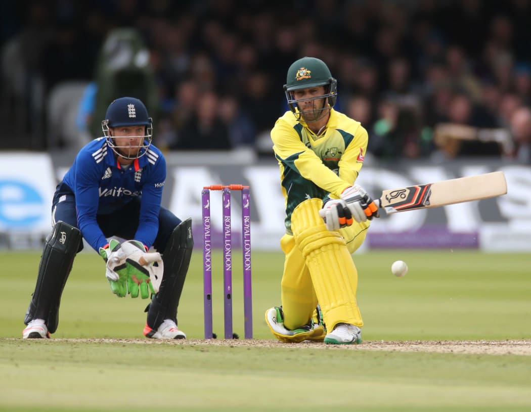 Glenn Maxwell reverse sweeps Moeen Ali during the second International between England and Australia at Lord's.