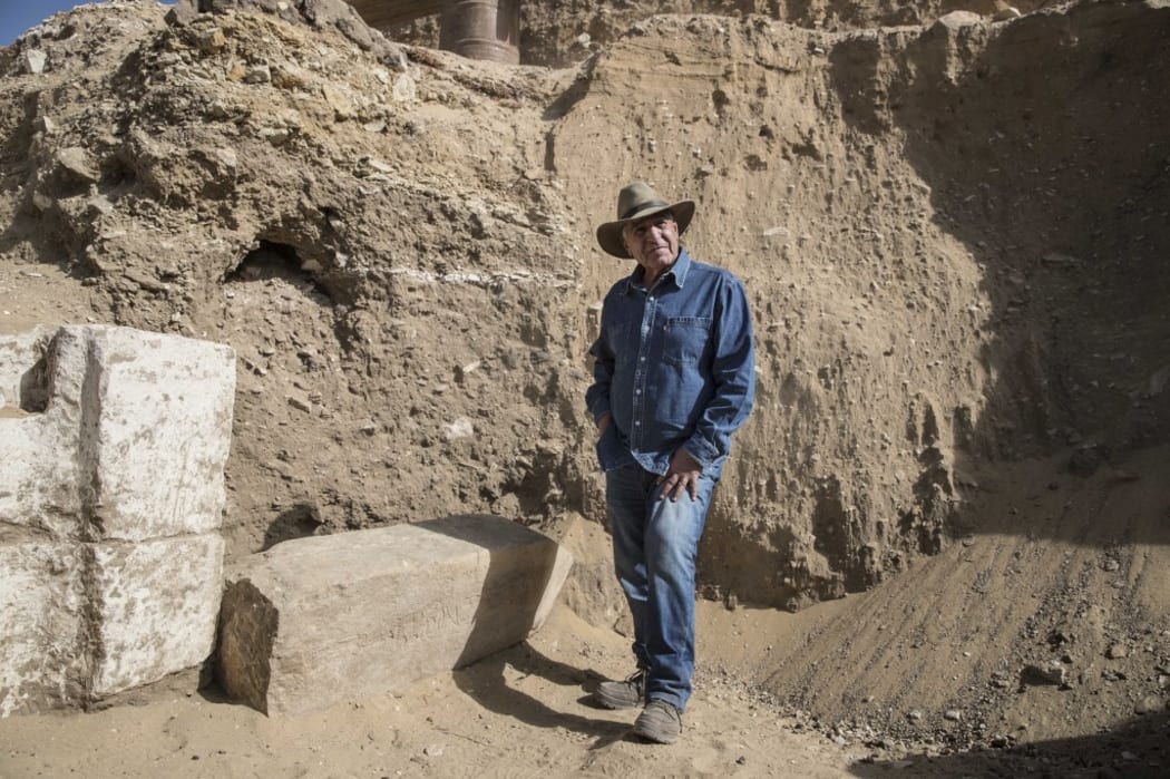 (FILES) In this file photo taken on January 17, 2021, Egyptologist Zahi Hawass poses for a picture during the official announcement of the discovery by an archaeological mission he leads of a new trove of treasures at Egypt's Saqqara necropolis south of Cairo.