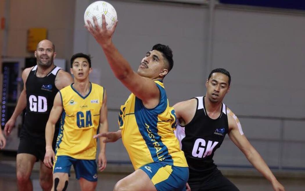 Australian men's goal shooter Junior Levi with ball in hand at the 2018 Trans Tasman Cup