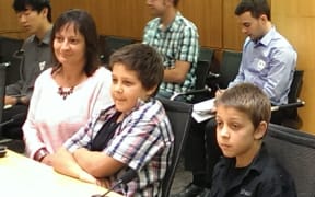 From left, boys' mother Mel Pipsen, Sean Roberts, Cody Roberts.