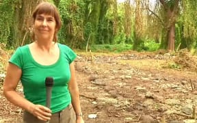 Jane Downes next to the paepae.