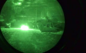 A rescue helicopter at the scene of the assault in Piopio