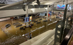 Flooding at the international terminal during Auckland Anniversary flodos in January 2023. (Supplied) Single use