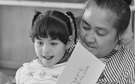 Samoan pre-school administrator Fereni Ete, reading a story in Samoan, Wellington, 1988 Evening Post newspaper