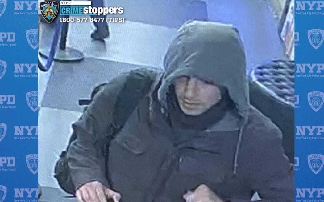 NYPD release photos of suspected gunman without mask