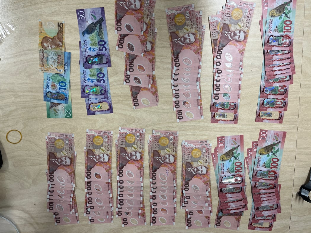 Money seized from police in relation to an alleged blessing scam.